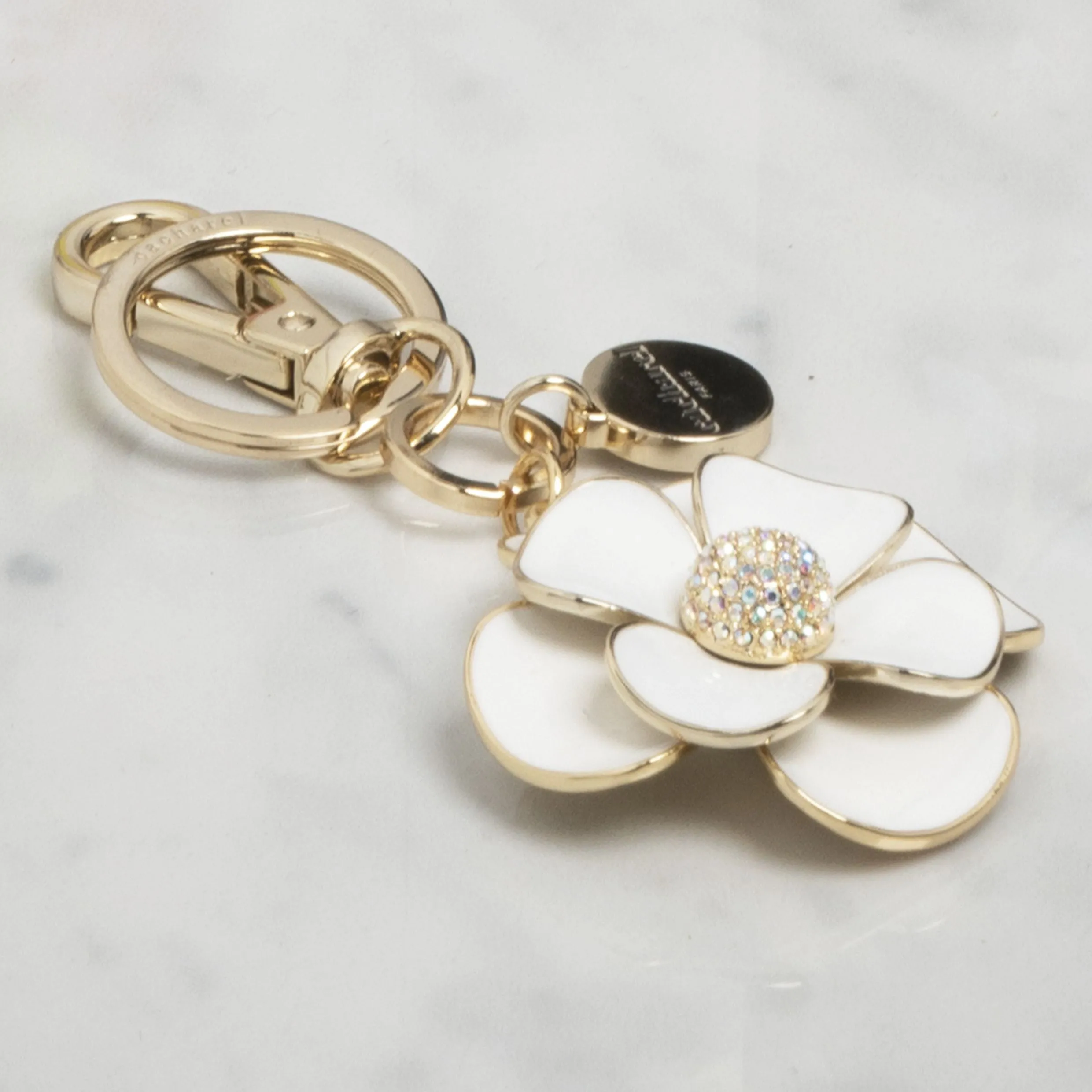 Cacharel CAK937F-Key ring Madeleine White