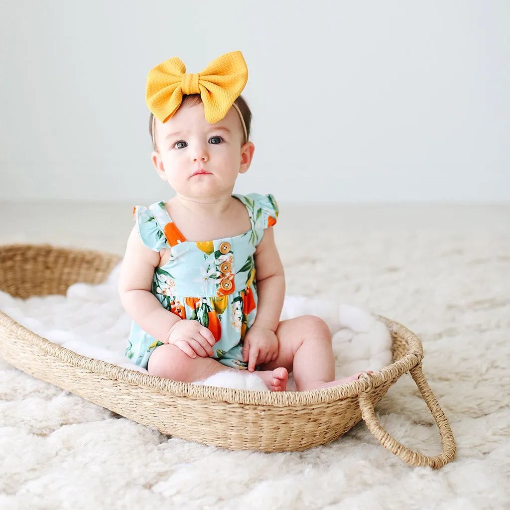 Posh Peanut Mirabella Henley Ruffled Capsleeve Bubble Romper