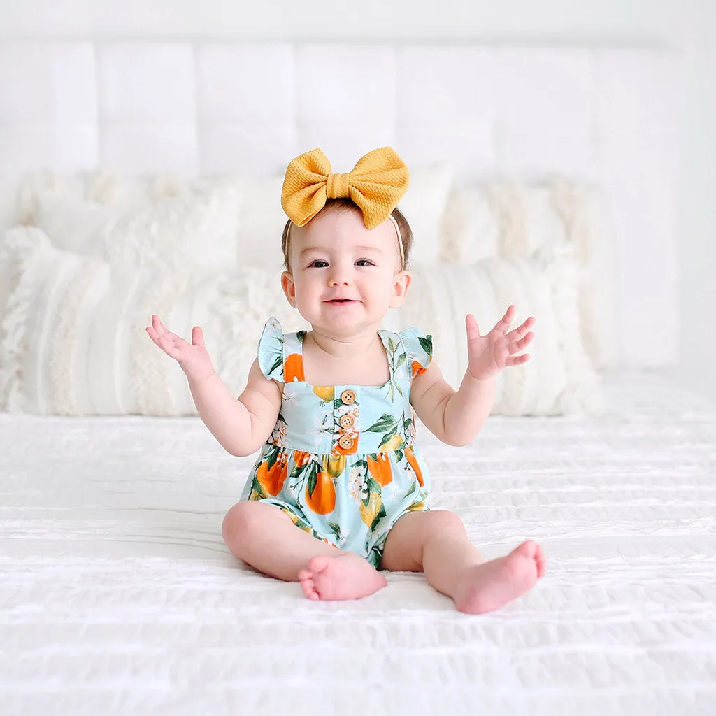 Posh Peanut Mirabella Henley Ruffled Capsleeve Bubble Romper
